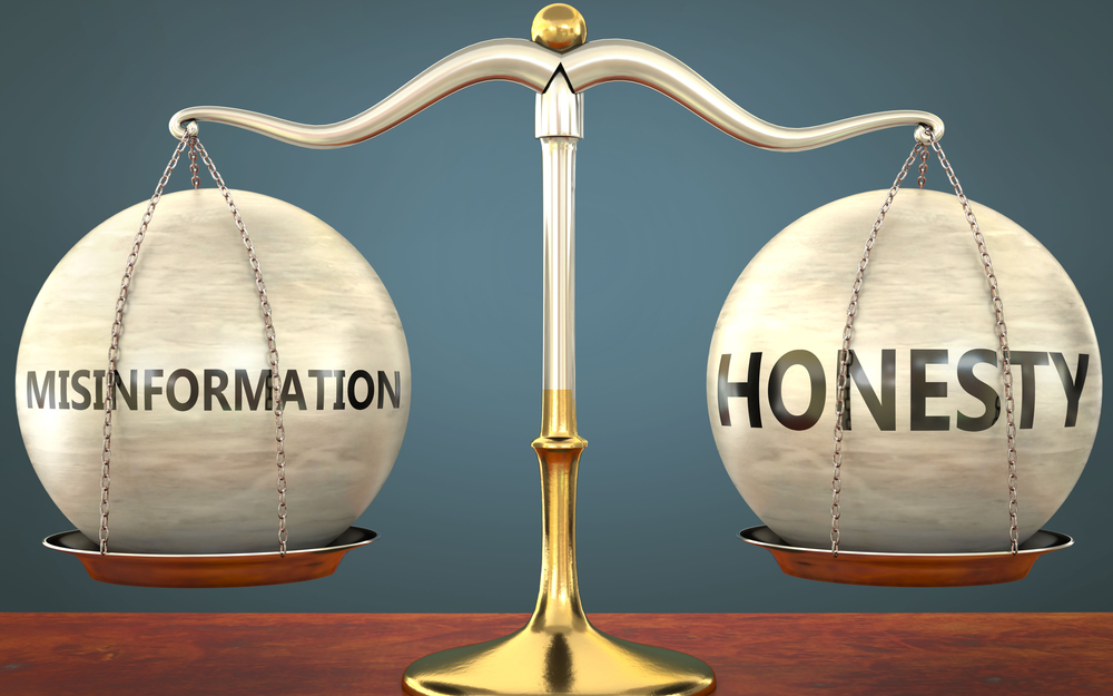 An image of a scale representing a balance between misinformation and honesty